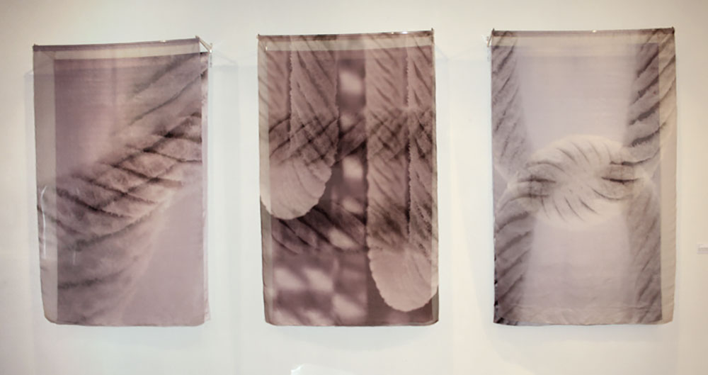 CARESS | Digital print on silk organza and silk satin; each 130cm x 200cm x 30cm. Photo: Catherine Dormor