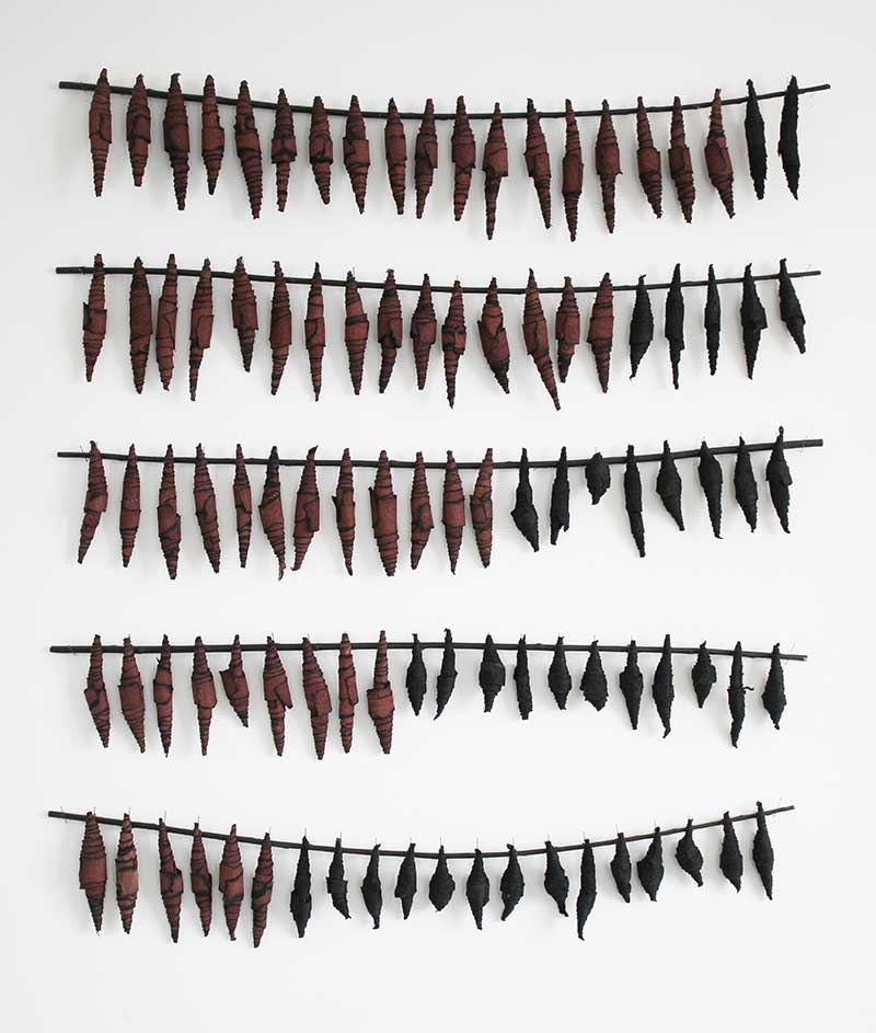 ON THE BRINK | Bark cloth, sticks, entomology pins, wire : Small installation, overall W74 x H84 x D2 cm. Photo: Ann Goddard.