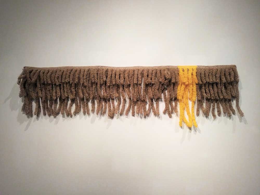 US AND OTHERS 1 - 2015 | Wall art piece in paper yarn | Techniques: knitting and crochet | Size:  Height 38 cm to 52 cm x width 163 cm x depth 3 to 7 cm