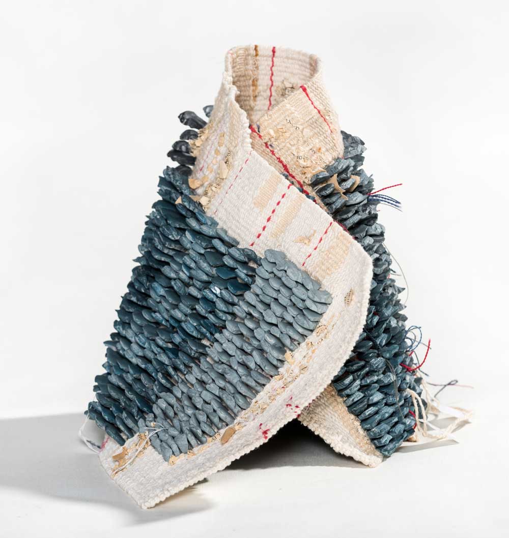 Guard Book I | 2020 | Materials: Jesmonite, debris, cotton, linen, paper | Techniques:  Handcast jesmonite & tapestry weave | Image: Mat Dale