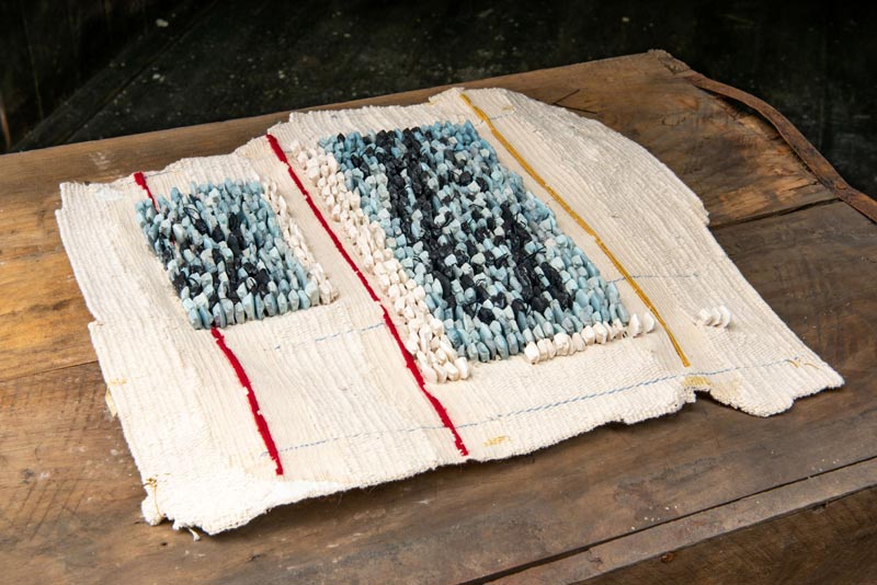 Peg Plan Study II | 2022 | Materials: Jesmonite, debris, worsted wool, cotton, linen | Techniques: Handcast jesmonite & tapestry weave | Image: Mat Dale