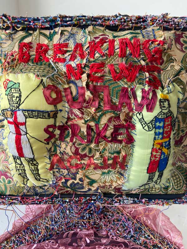 BREAKING NEWS : OUTLAW STRIKES AGAIN | 2022 | Materials: Old computer , thread , cotton , beads and pillow stuffing | Techniques: Embroidery | Image Credit: Athena Nemeth